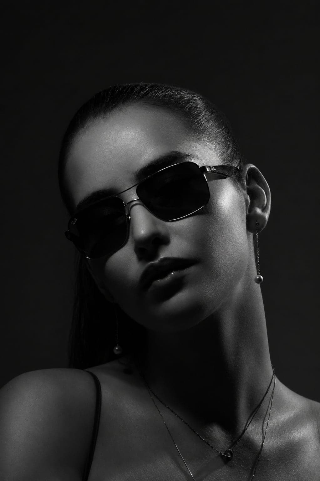 Black and white sunglasses portrait photographed at VibeShack Studios San Francisco