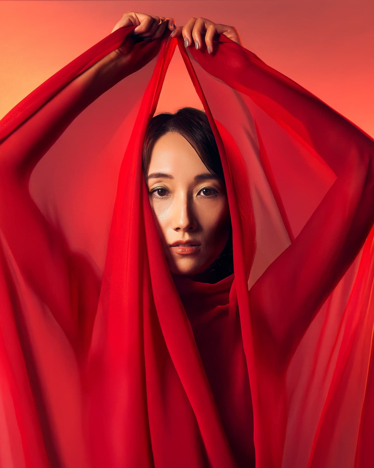 Red fabric editorial portrait made at VibeShack Studios San Francisco