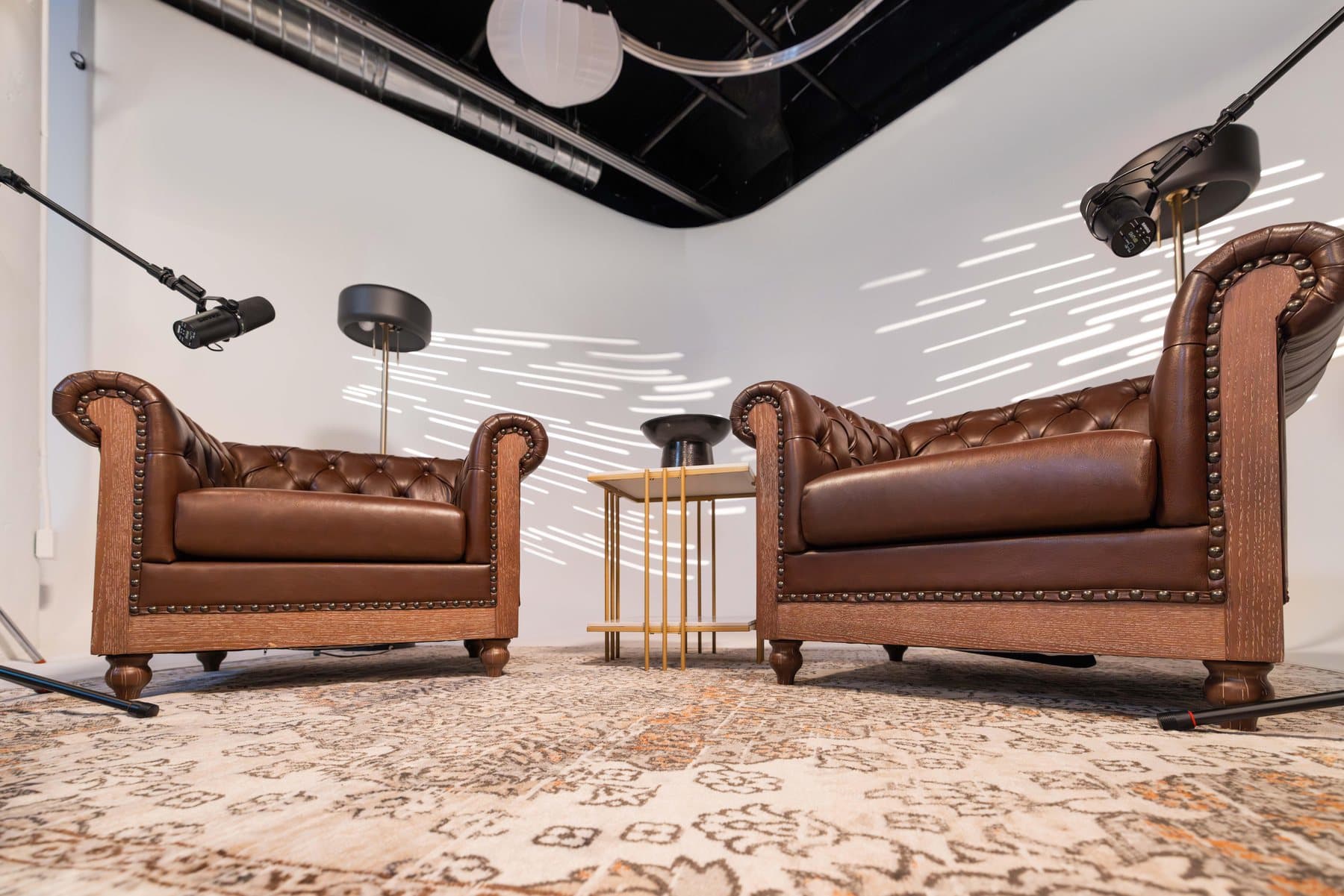 Parlor premium interview setup with Chesterfield seating — VibeShack Studios San Francisco